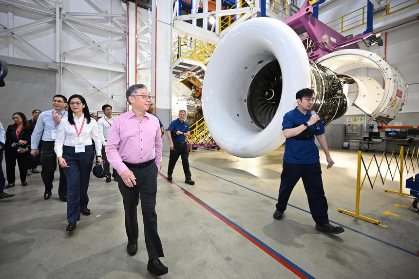 Deputy Prime Minister Gan Kim Yong walking past the Trent XWB engine in the engine preparation area in SAESL Test Cell on Jan 16.