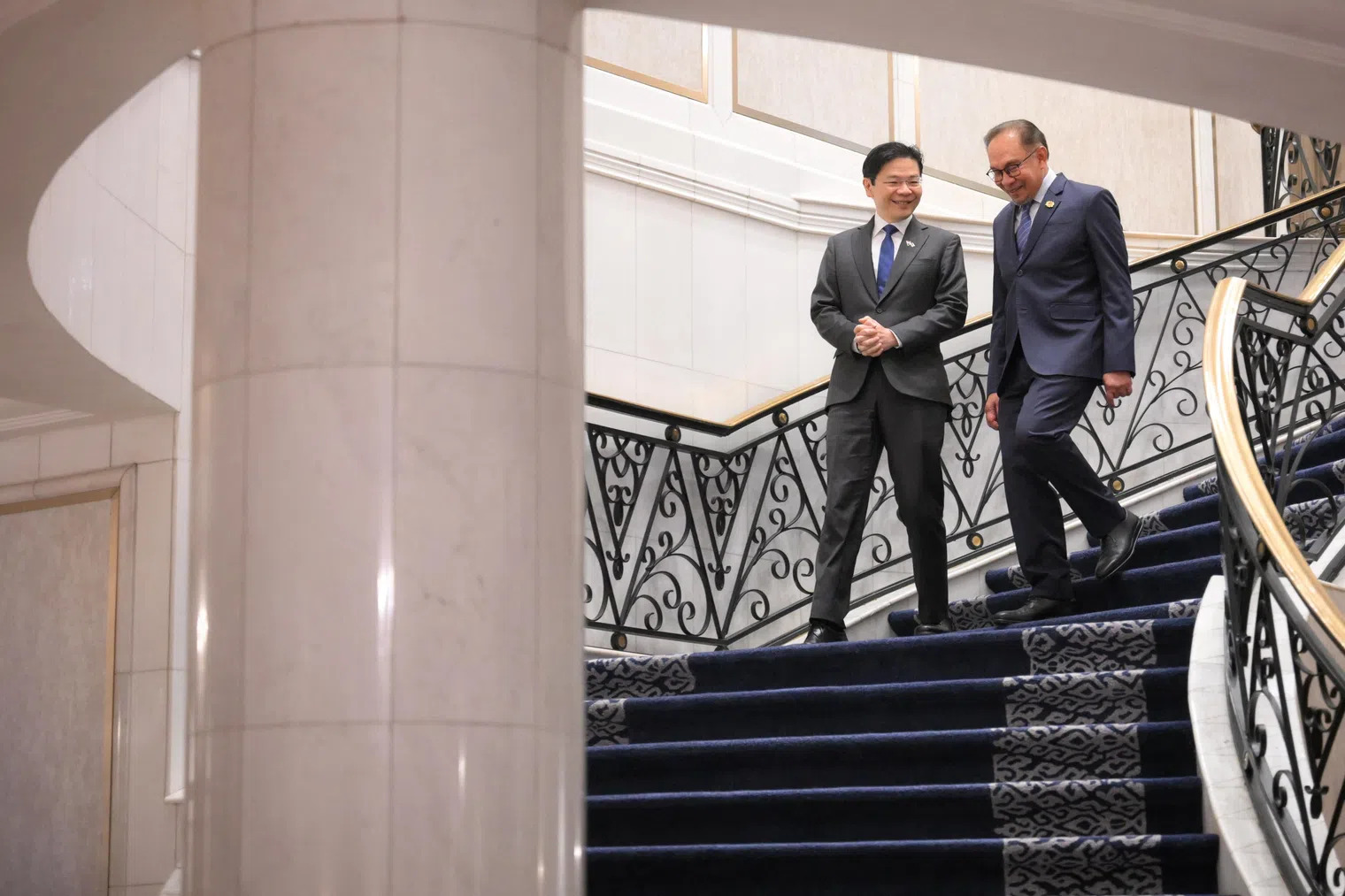 Malaysian Prime Minister Anwar Ibrahim (right) will host Prime Minister Lawrence Wong for the 11th Malaysia-Singapore Leaders' Retreat in Putrajaya.