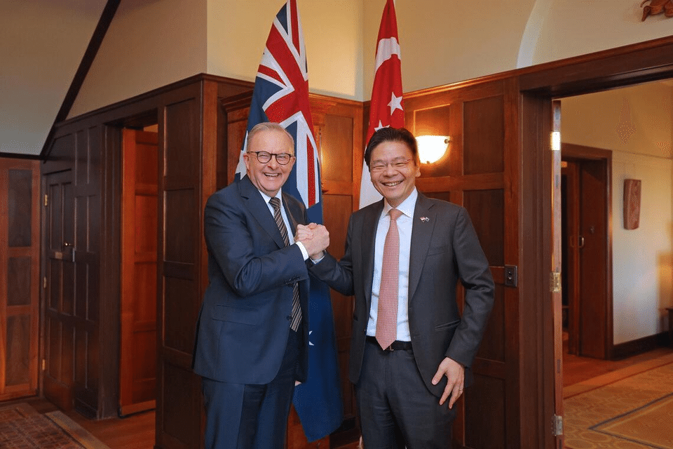 Prime Minister Lawrence Wong (right) with his Australian counterpart Anthony Albanese in Canberra on Oct 7.  PHOTO: MDDI