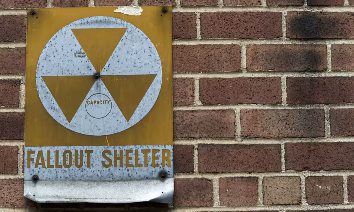 A nuclear fallout shelter sign hangs on a building in New York. The US was among 30 UN member states to abstain in the vote.