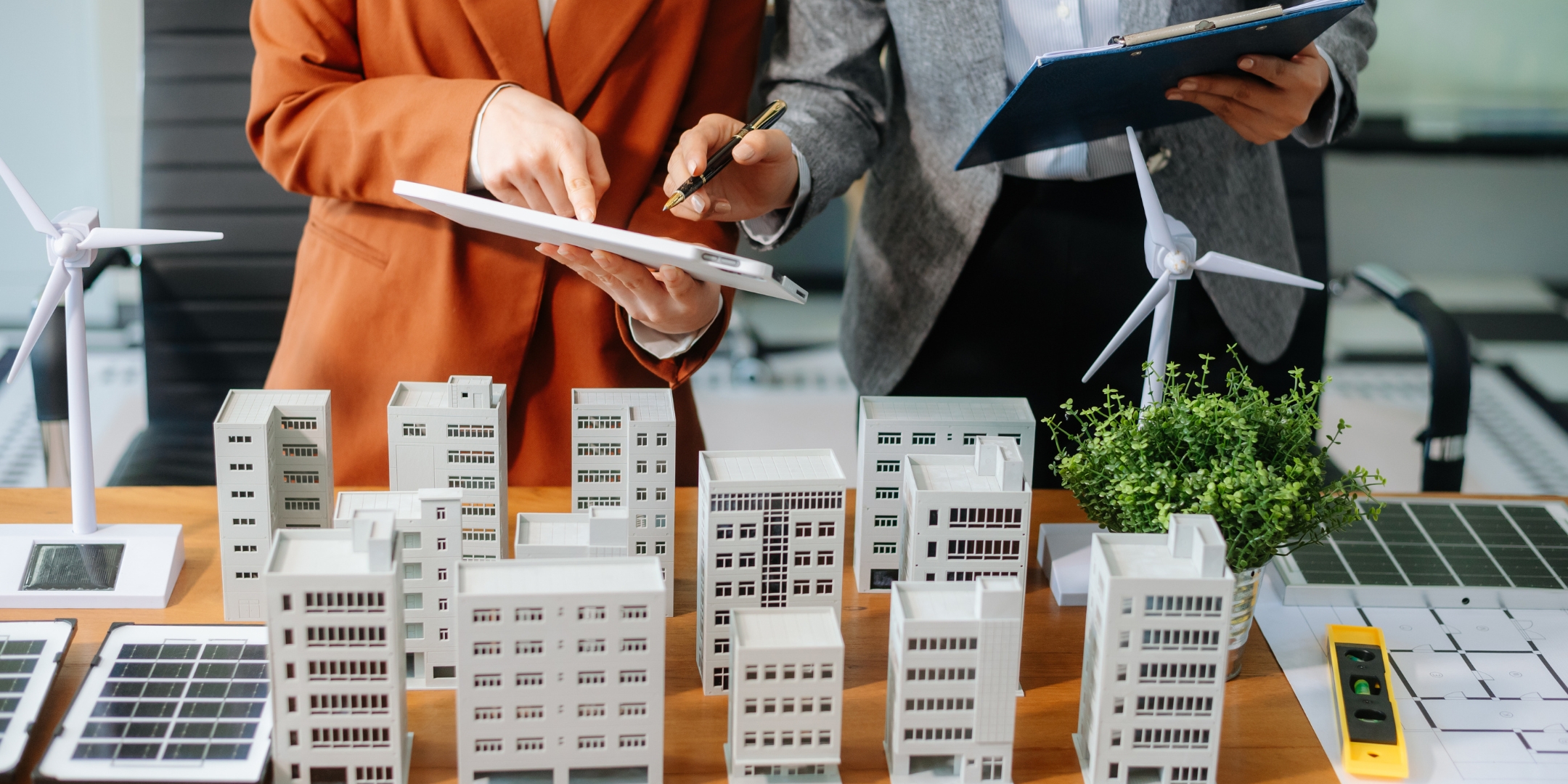 Executives discussing financing green investments